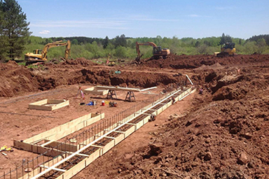 Footing Form and Rebar Placement Photo of footing and rebar placement